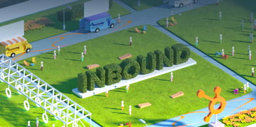 Screenshot from the INBOUND event platform showing a rendering of a grass sculpture that says INBOUND with people surrounding it.